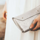 Shimmer Silver leather Ailla clutch bag 