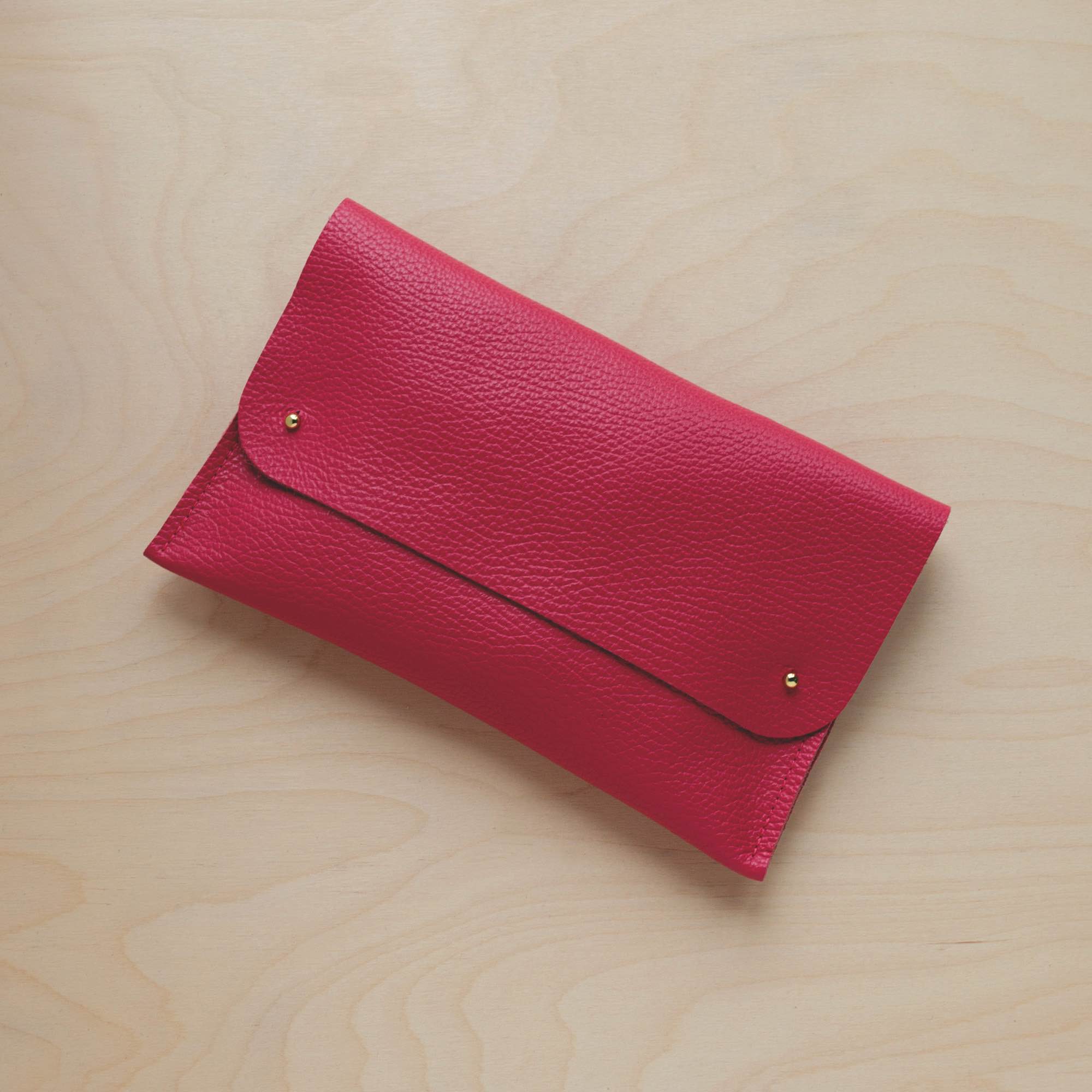 Raspberry pink leather clutch bag 