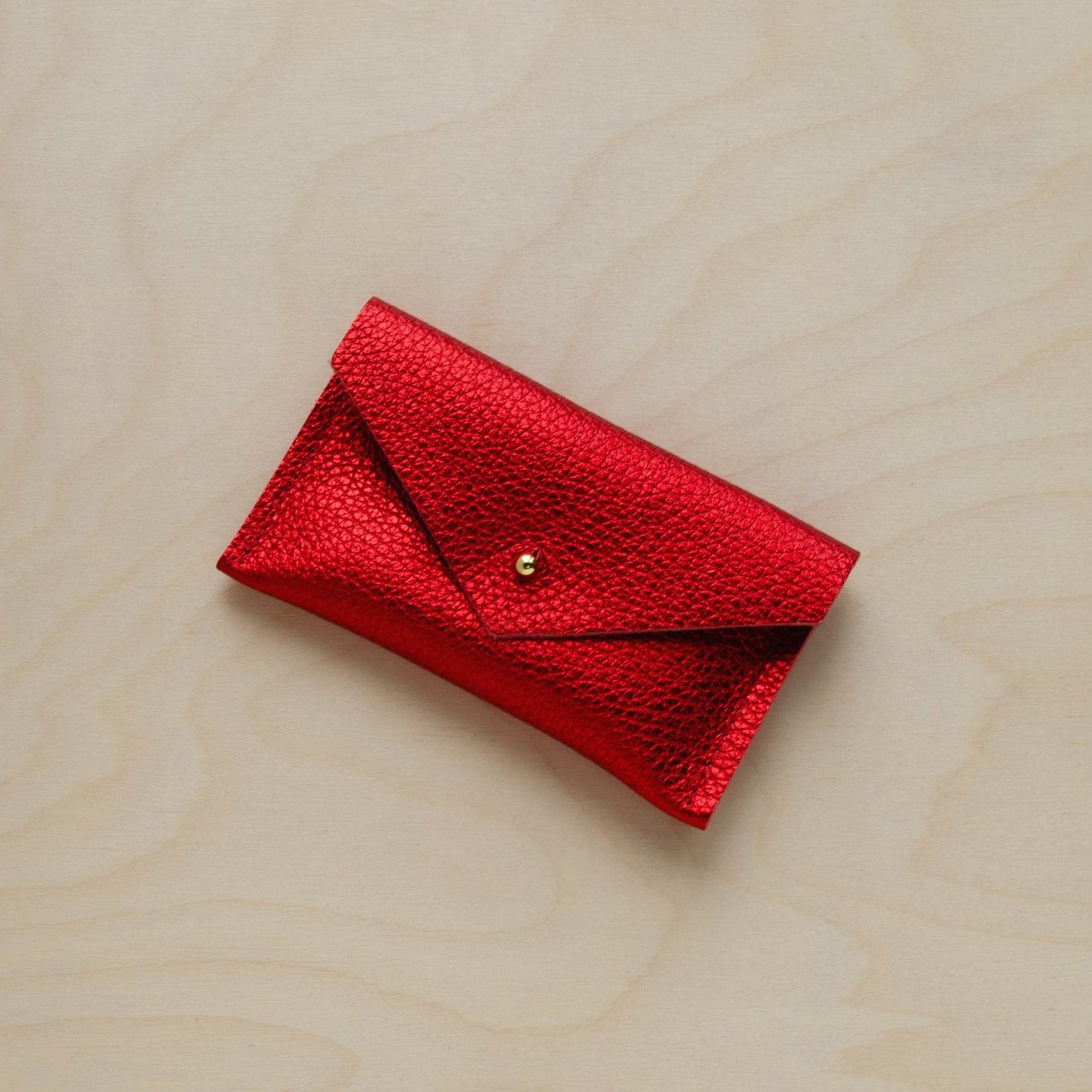 Metallic Red leather card holder.