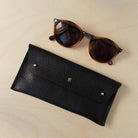 Double stud glasses case personalised in black leather.