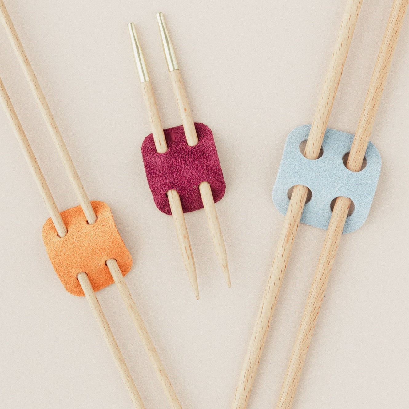 Suede knitting needle holders
