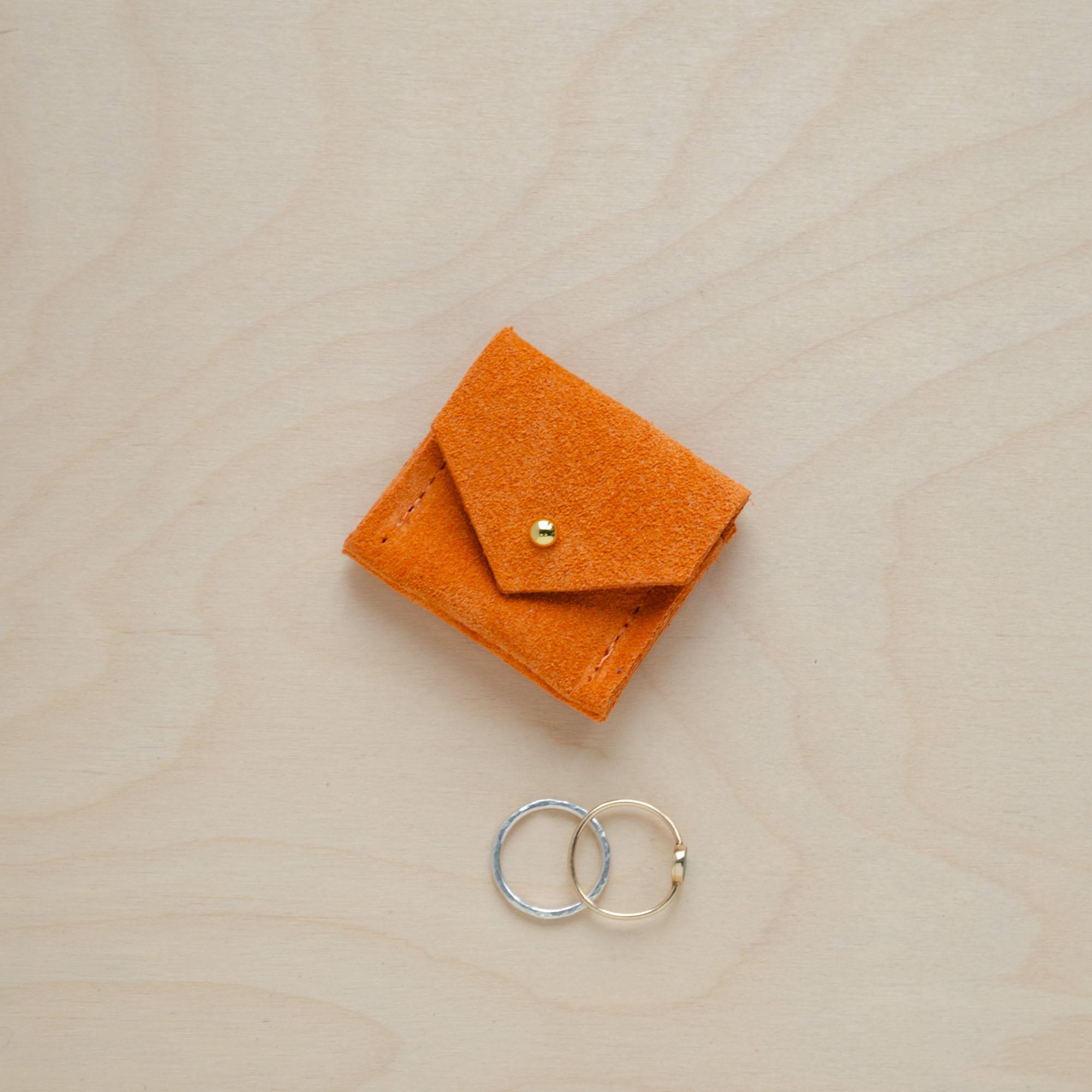 Clementine Orange Wedding Ring Pouch in suede.