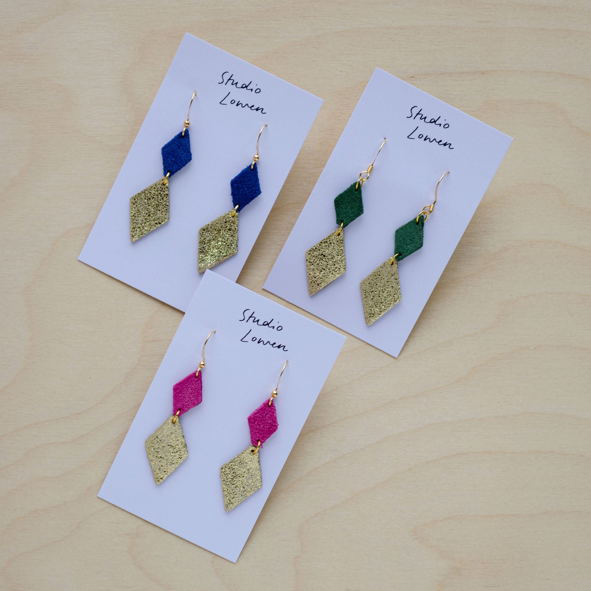 Three pairs of the Sofie Dangle Earrings in Ultramarine Blue, Moss Green, Fuchsia Pink 