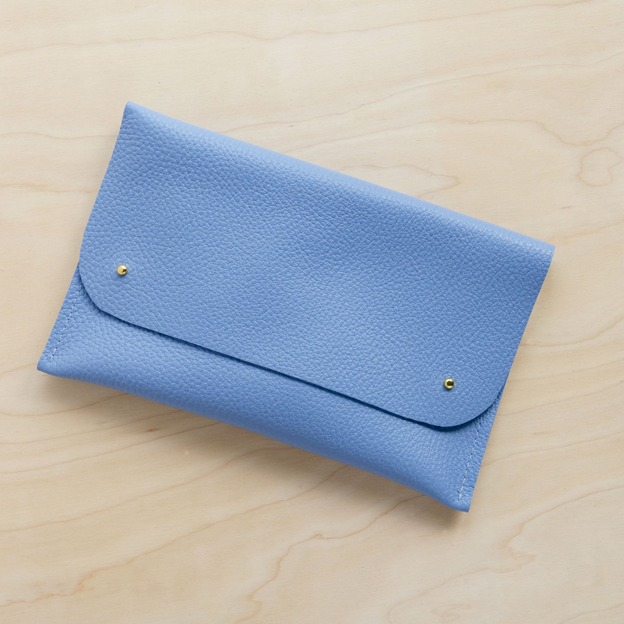 Blue leather clutch on sale wristlet